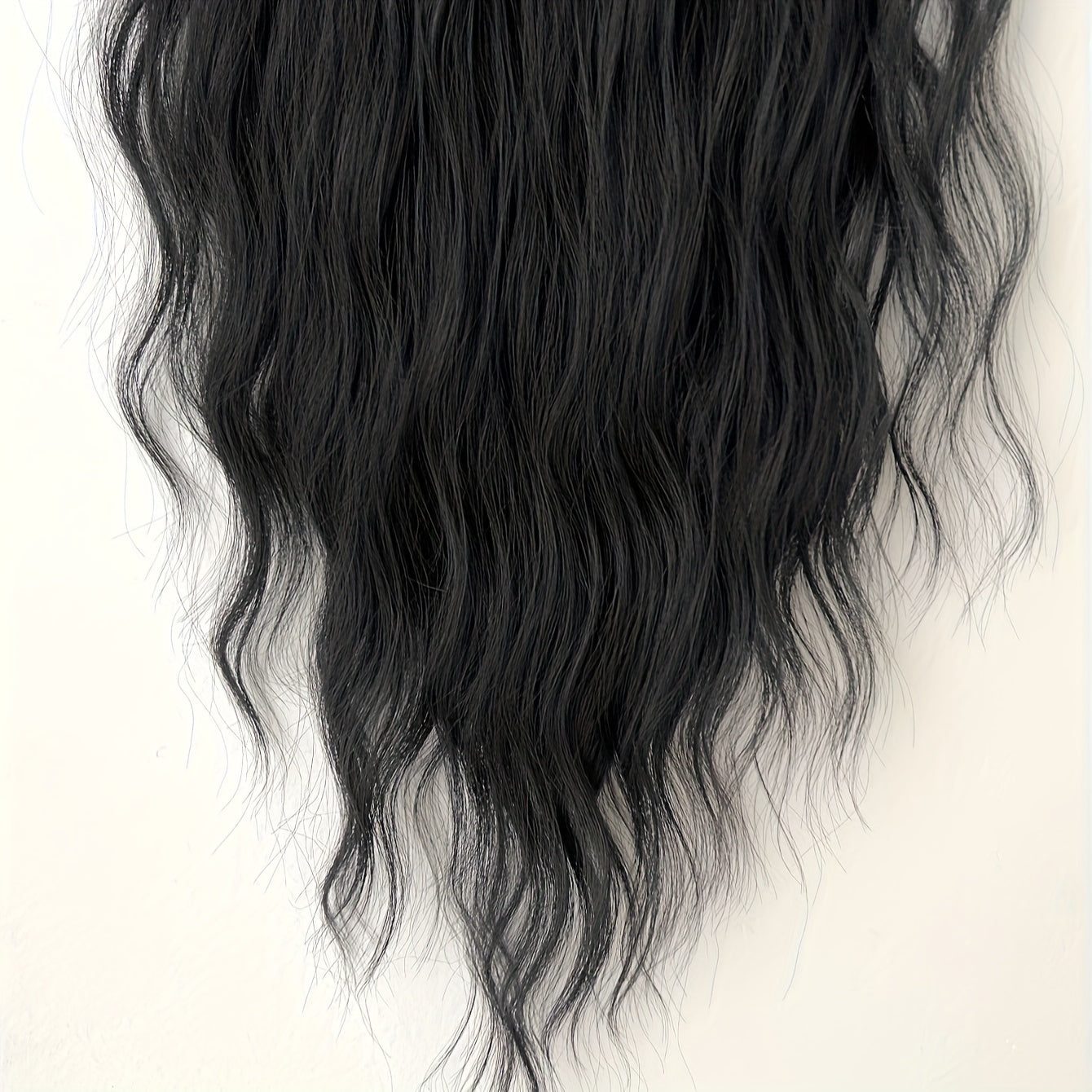 Synthetic Hair Extensions in Black-Brown with 16 Clips, Measuring 22-24 Inches in Length, Featuring a Water Wave Style. This Set Includes 7pcs, Perfect for a Full Head Look for Women.