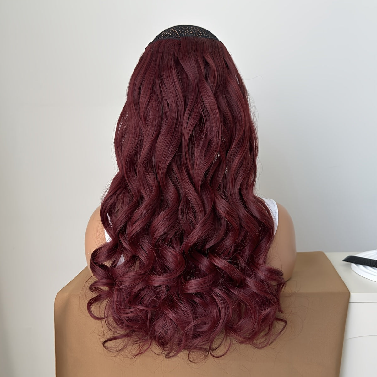 Synthetic Hair Extensions in Black-Brown with 16 Clips, Measuring 22-24 Inches in Length, Featuring a Water Wave Style. This Set Includes 7pcs, Perfect for a Full Head Look for Women.